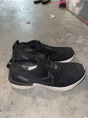 Nike Black Slip-On Knit Running Sneakers with White Sole Accents